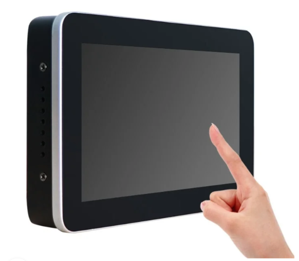 A finger touching the screen of a device