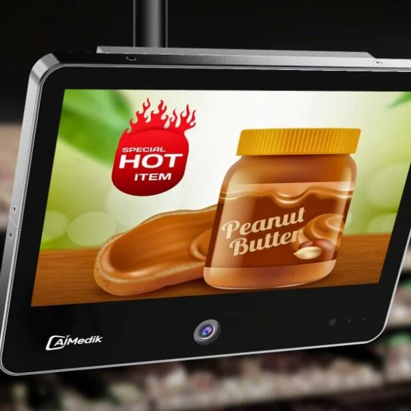 A GKIPV1330 13.3-inch Full HD IP Public View Surveillance Video Recording Monitor, acting as a surveillance monitor, advertising peanut butter as a special hot item.