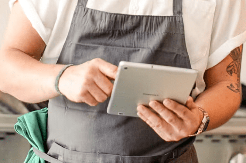 Chef holding tablet